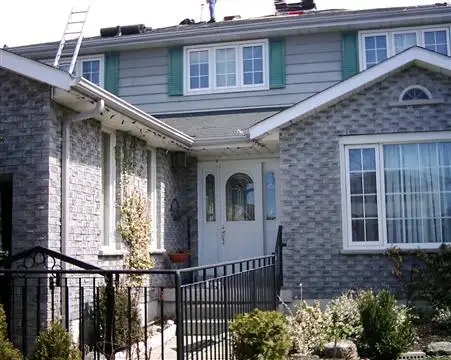 Brown Bros Roofing crew at work on a local home