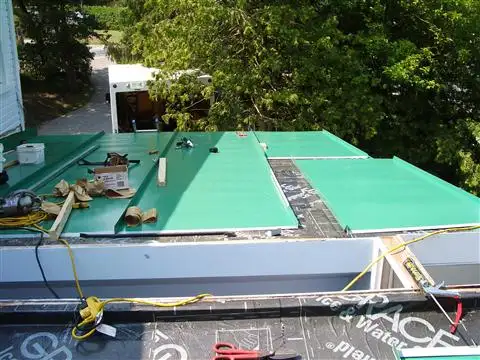Custom metal work on a roof valley