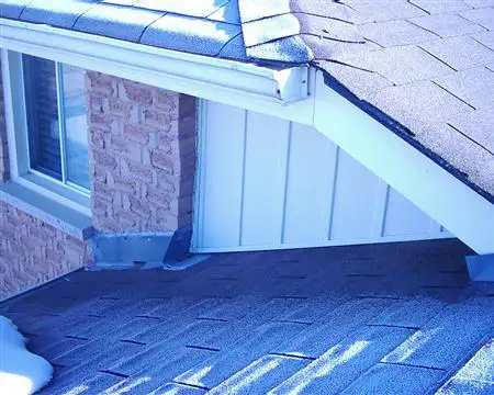 Roof repair work completed on a residential shingle roof